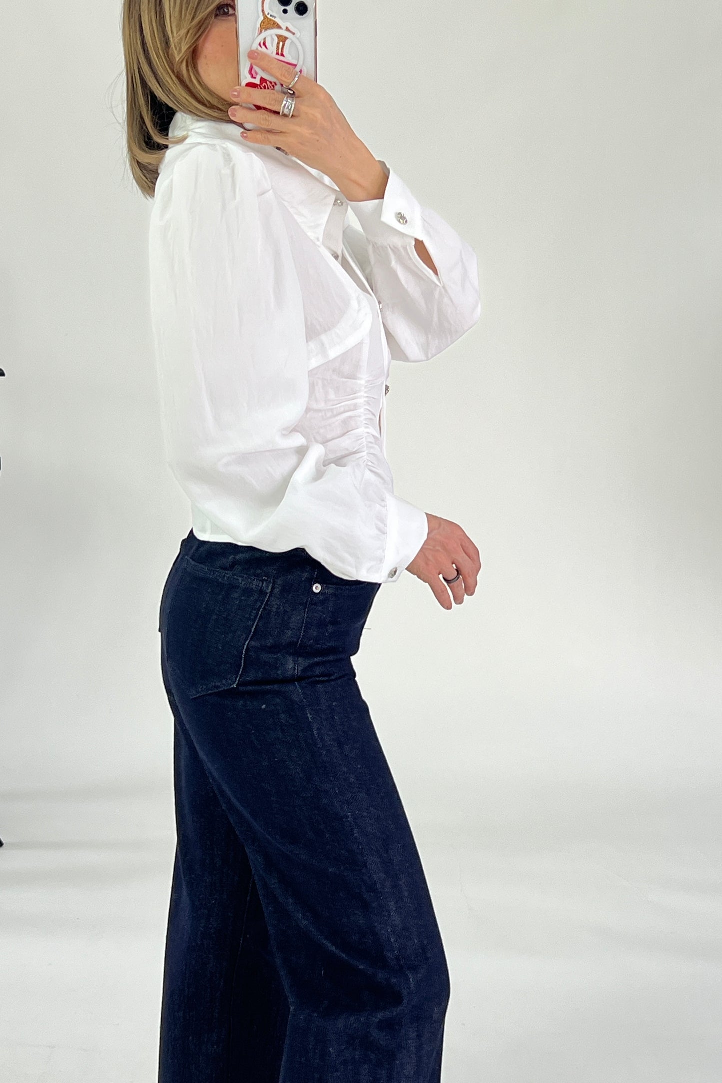 BLUSA BAJO EN PICOS