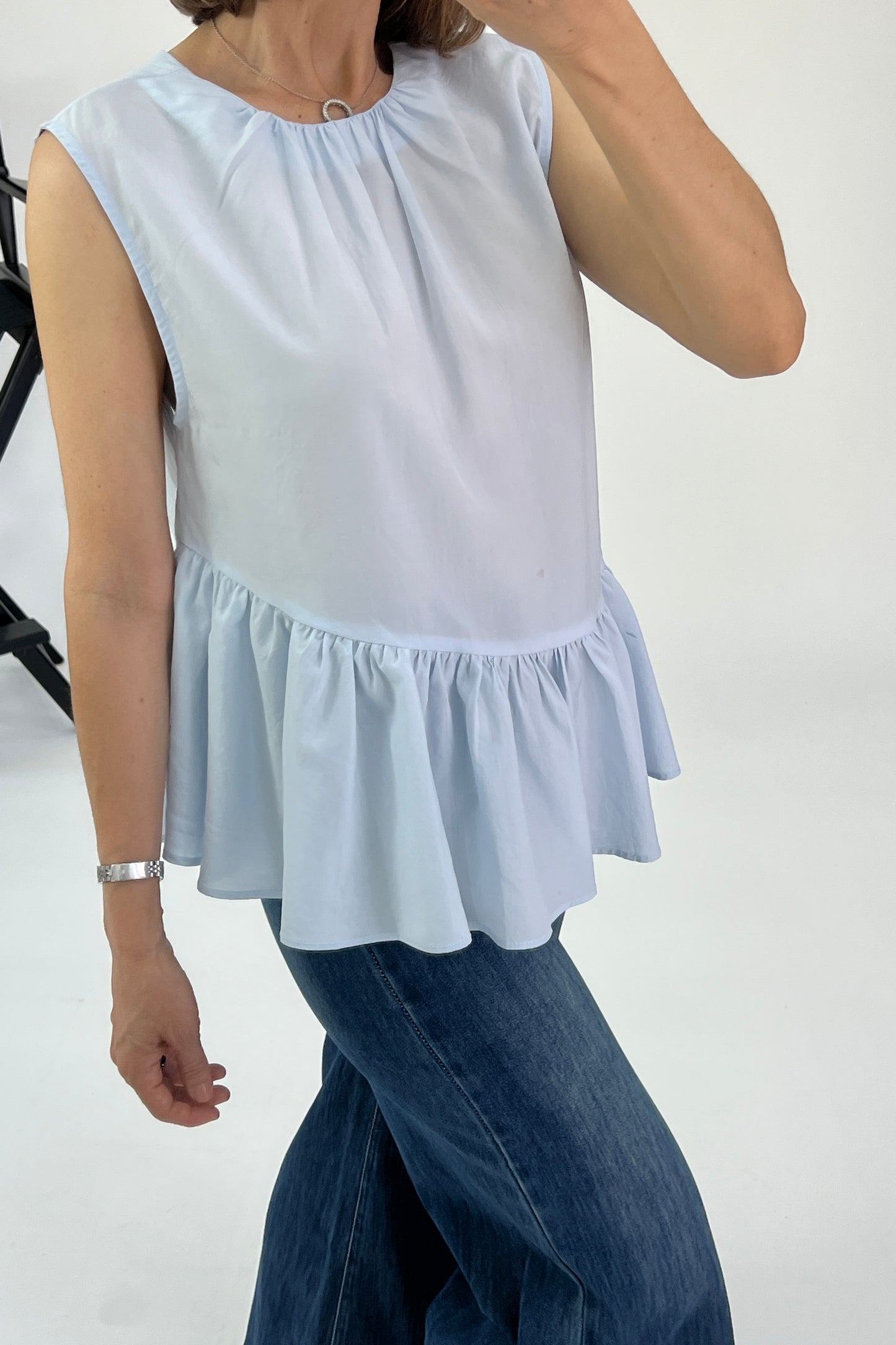 BLUSA BAJO IRREGULAR