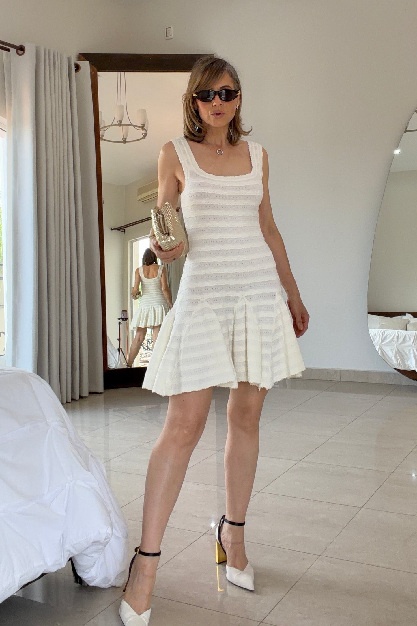 VESTIDO BAJO CON VUELO