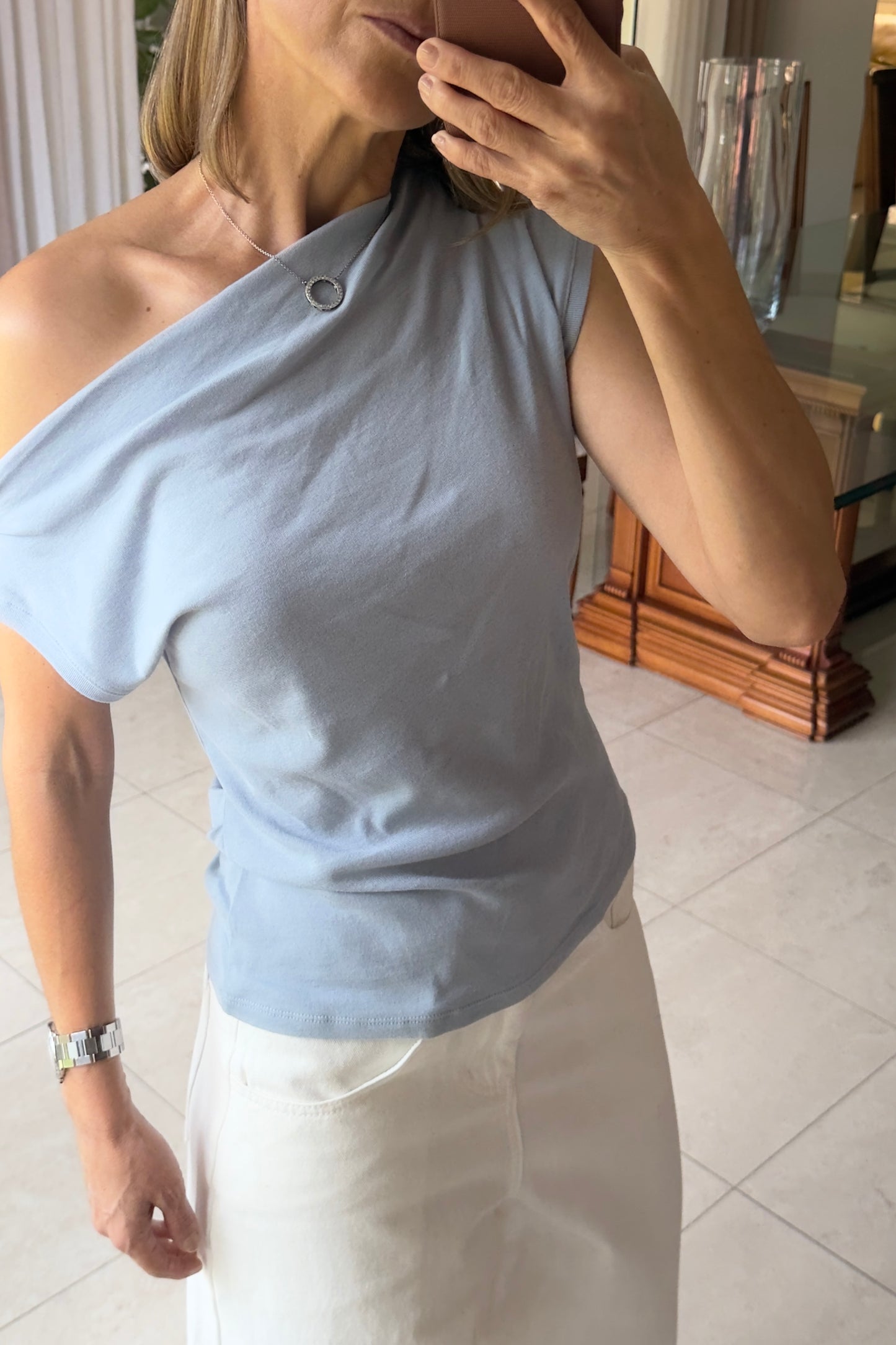 BLUSA HOMBROS IRREGULARES