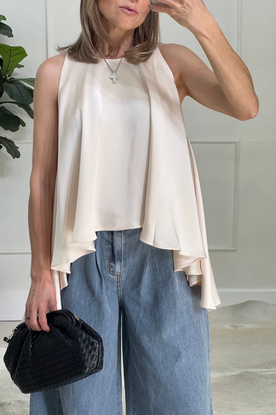 BLUSA BAJO IRREGULAR