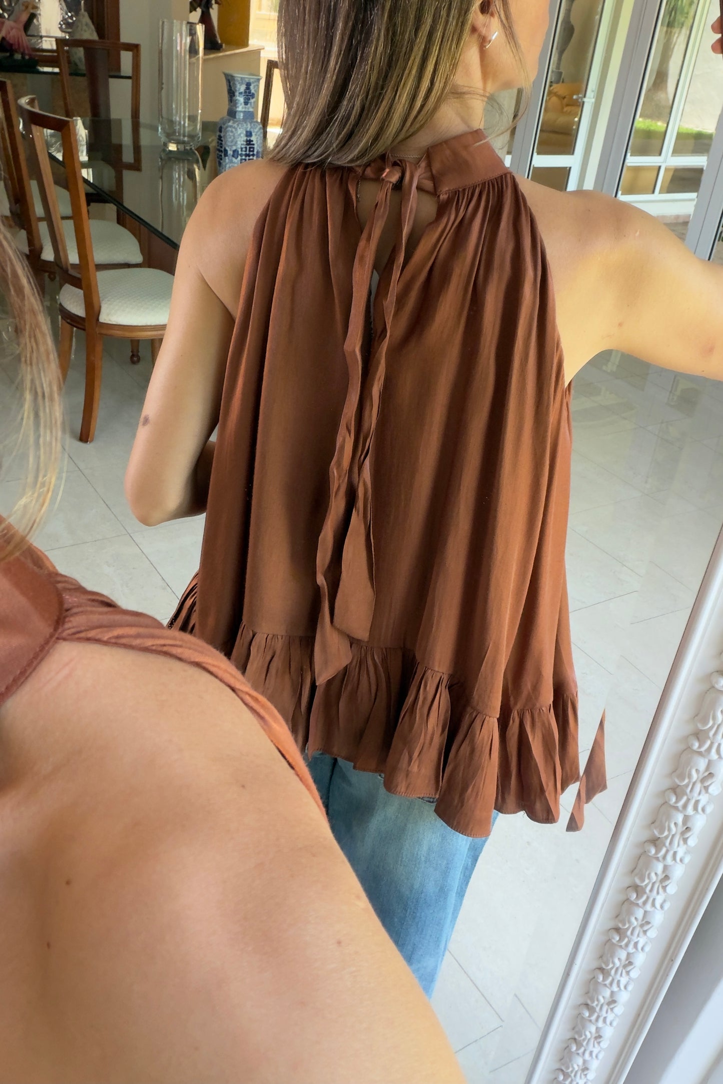 BLUSA BAJO IRREGULAR