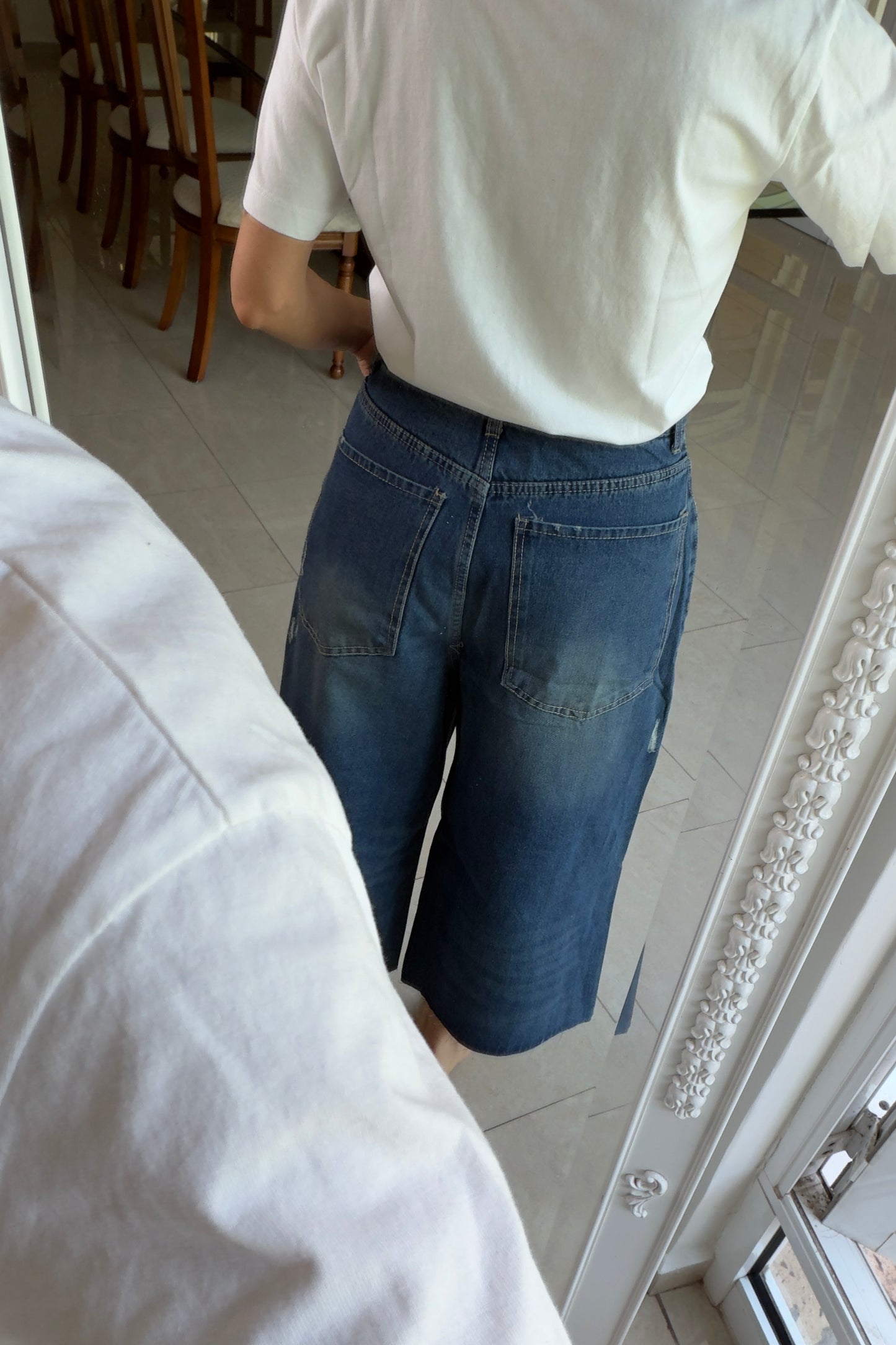 BERMUDAS DETALLES DESGARRADOS