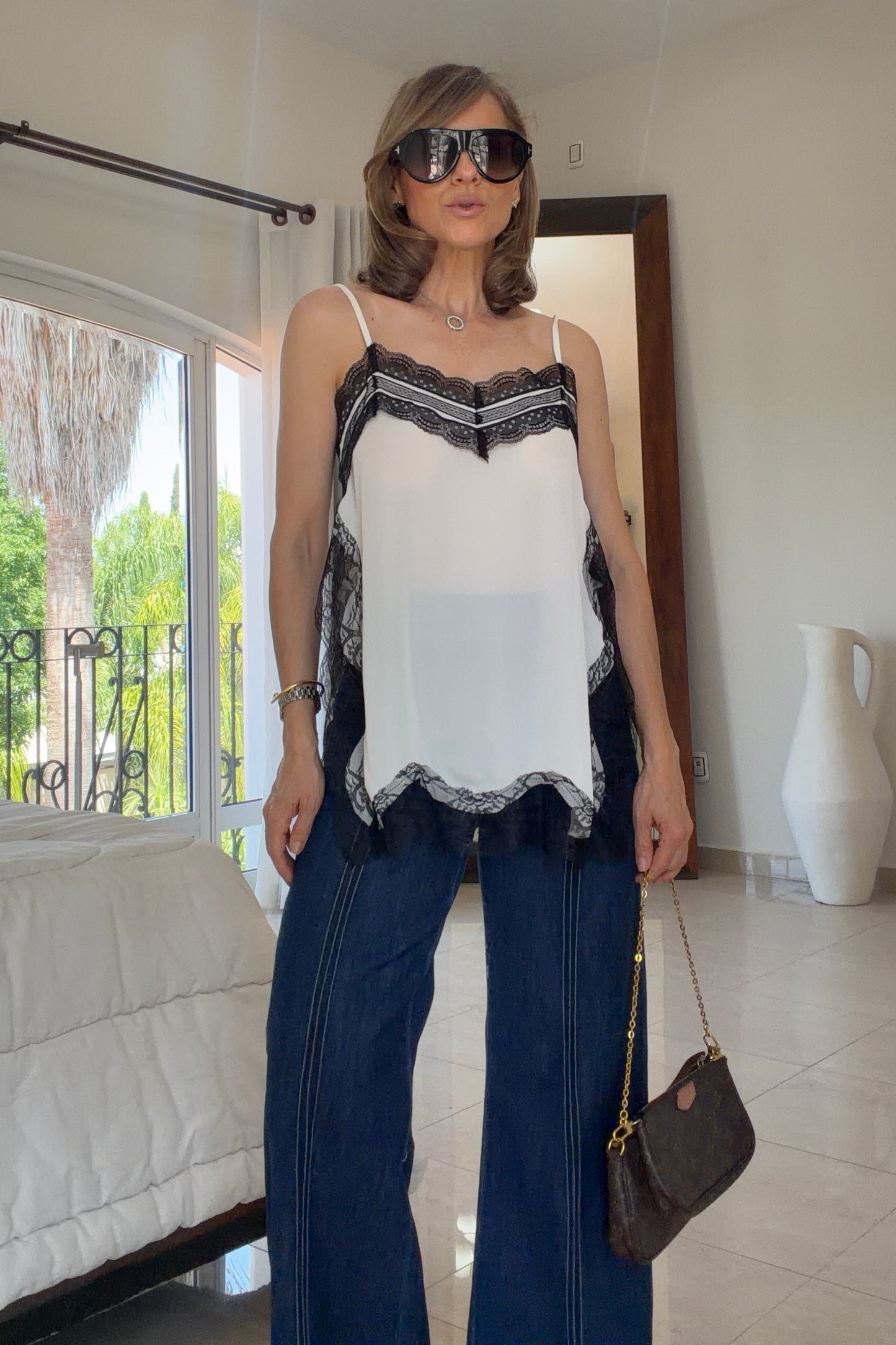 BLUSA ABERTURAS COSTADOS