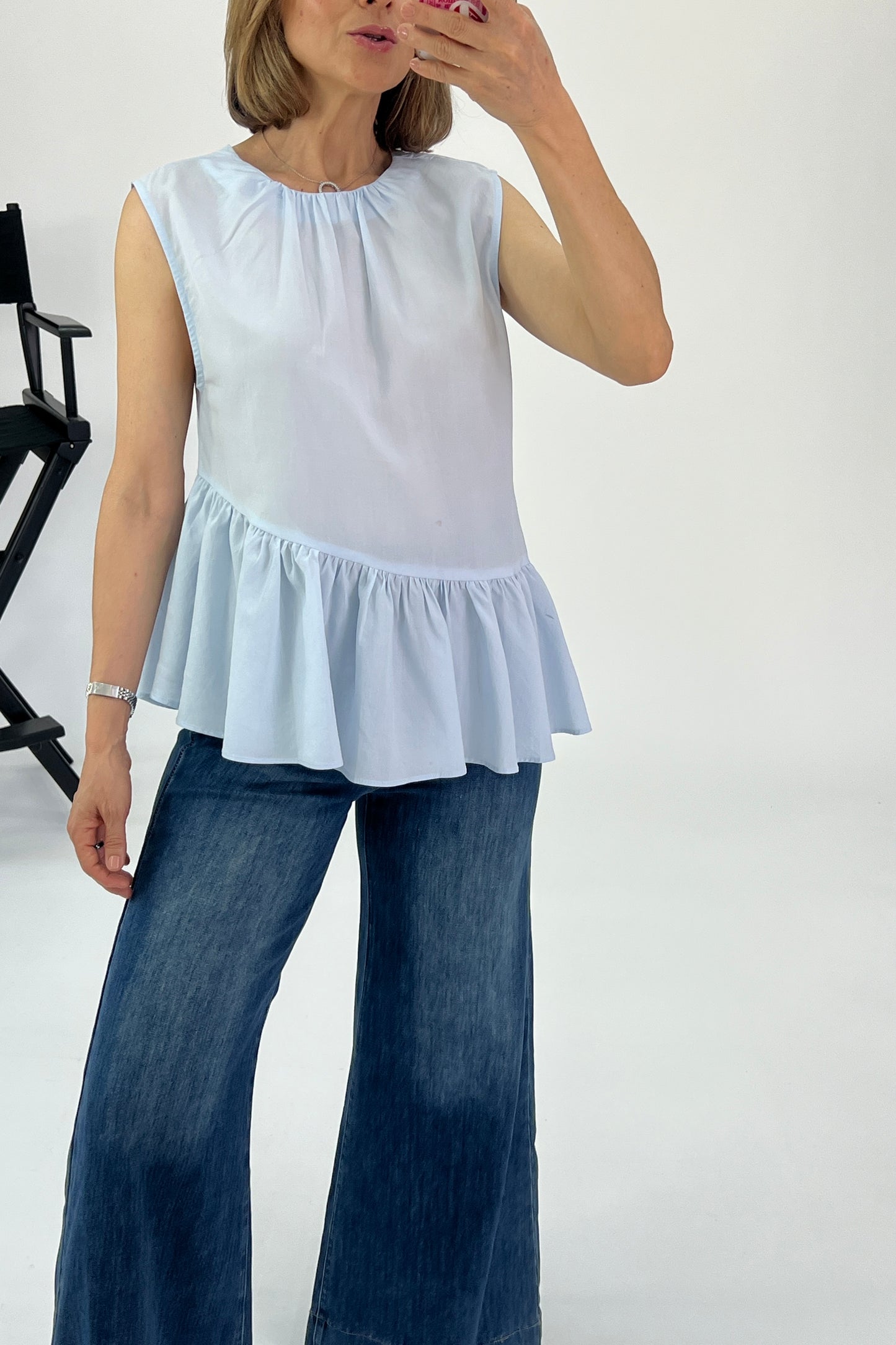 BLUSA BAJO IRREGULAR