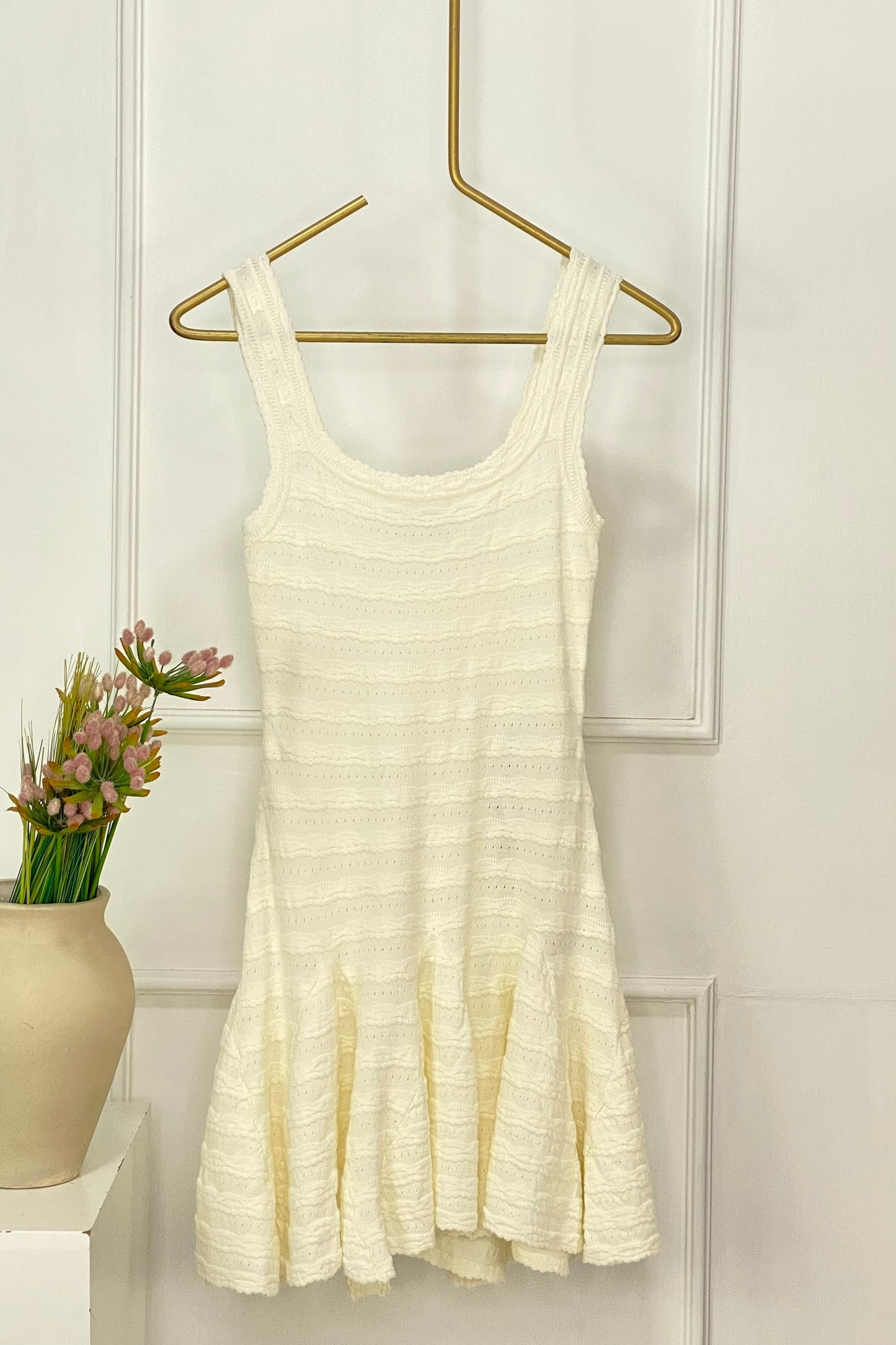 VESTIDO BAJO CON VUELO