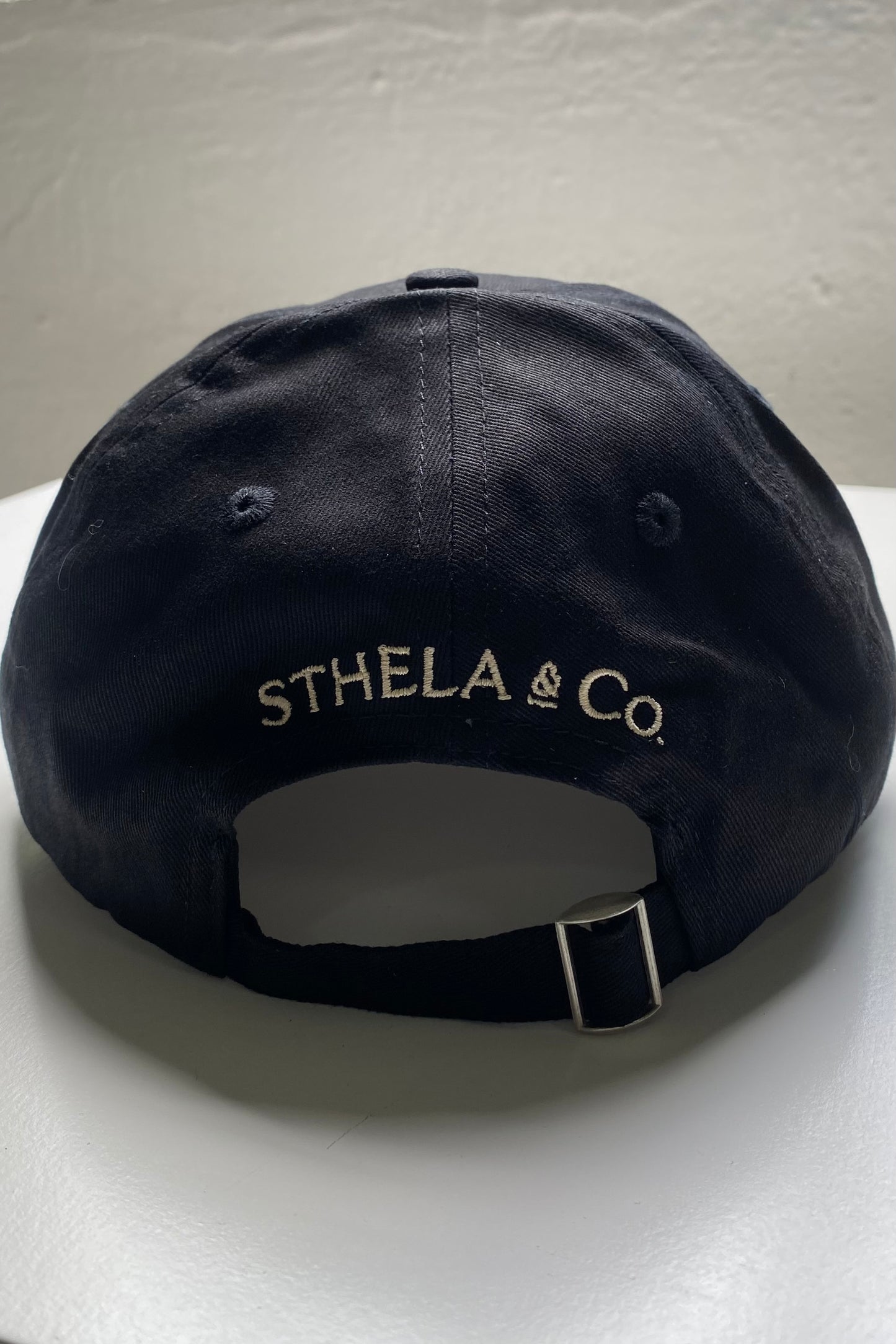 CAP STHELA & CO