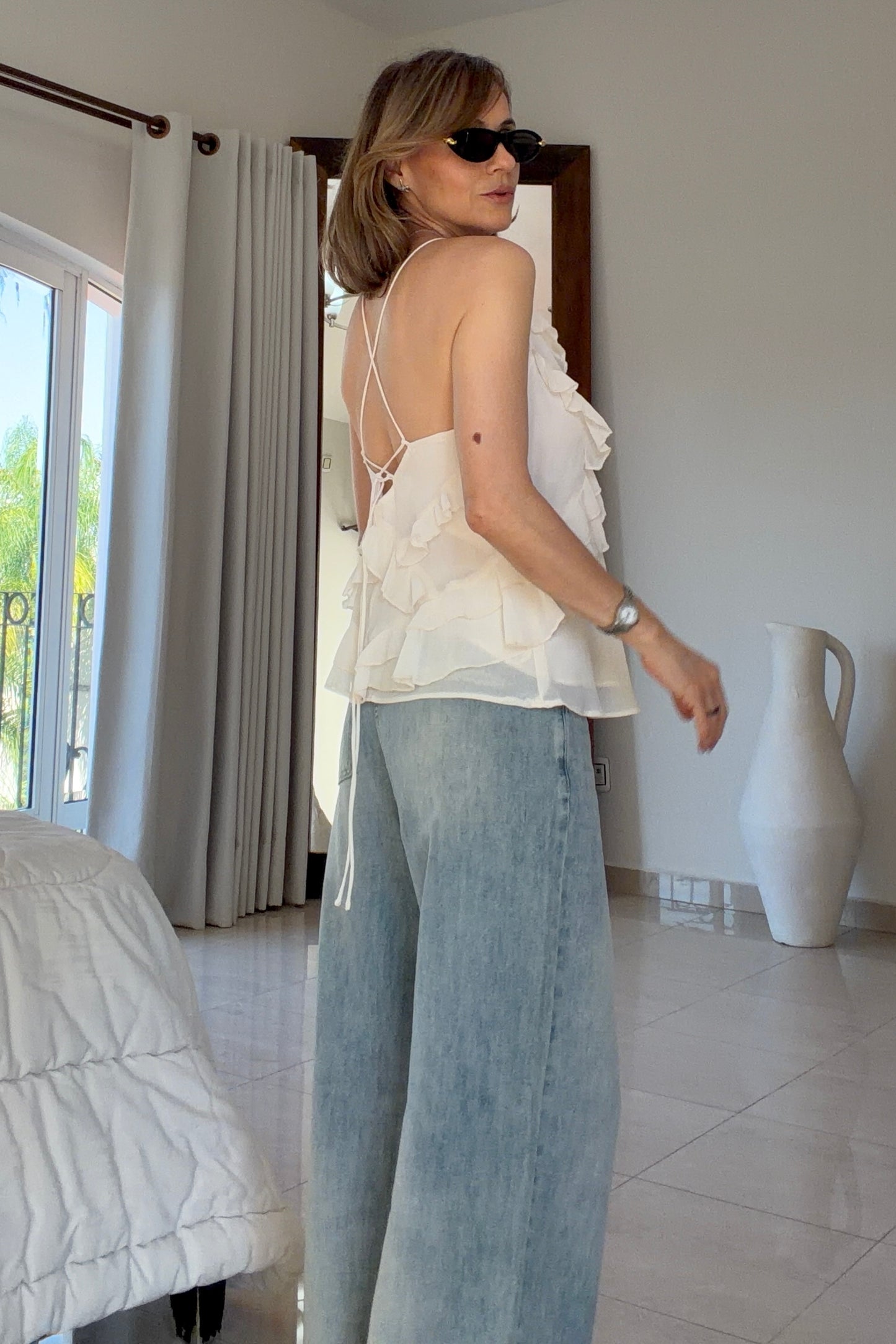 BLUSA OLANES ASIMETRICOS