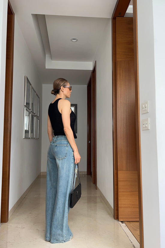 JEANS BOTON IRREGULAR