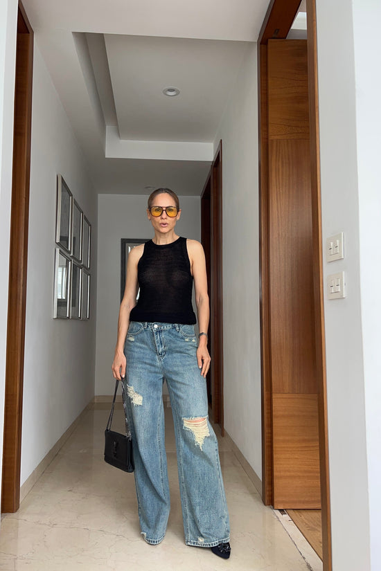 JEANS BOTON IRREGULAR