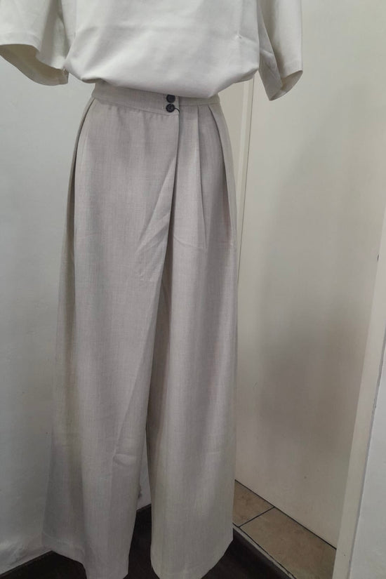 PANTALON BOTON IRREGULAR