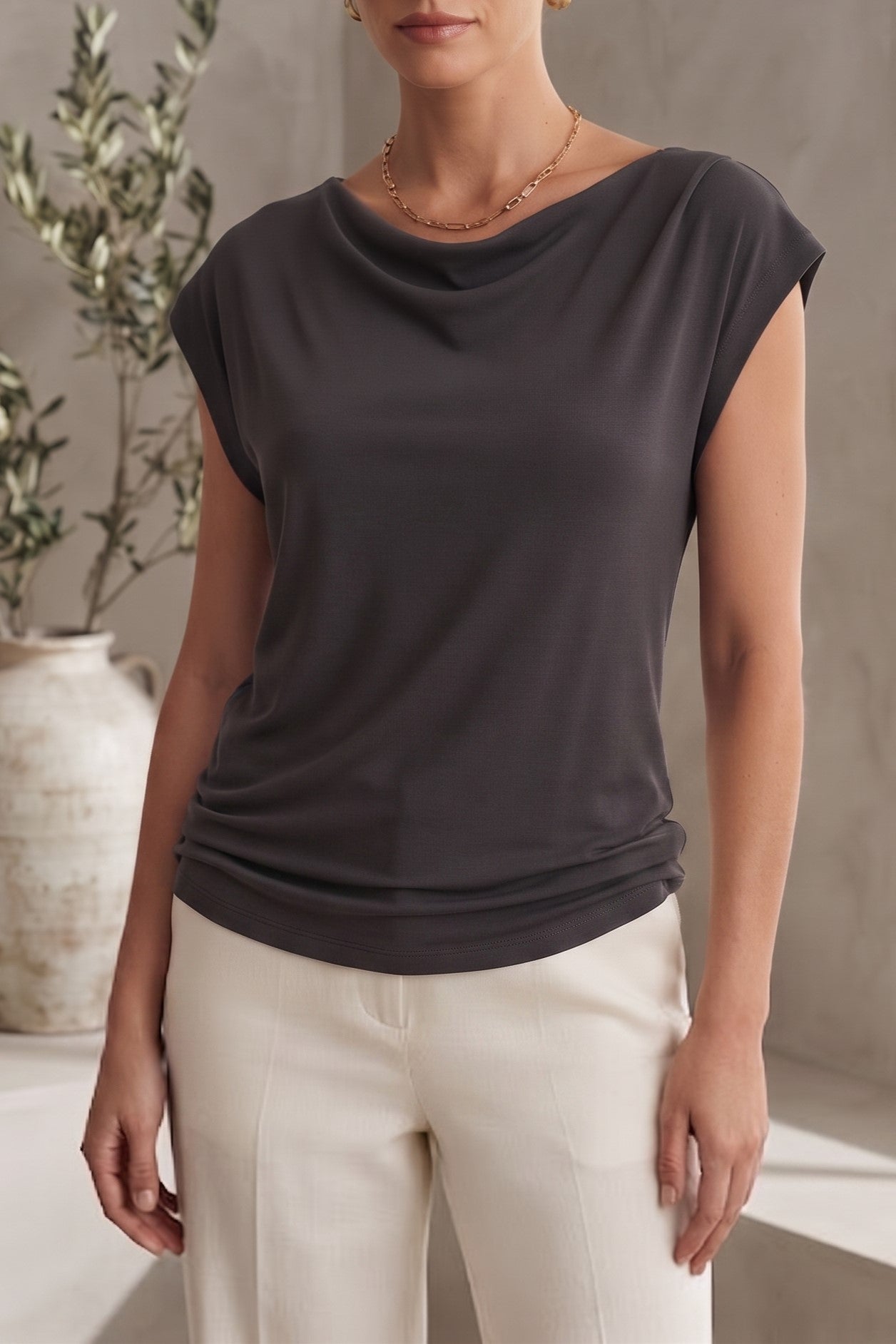 BLUSA HOMBROS IRREGULARES