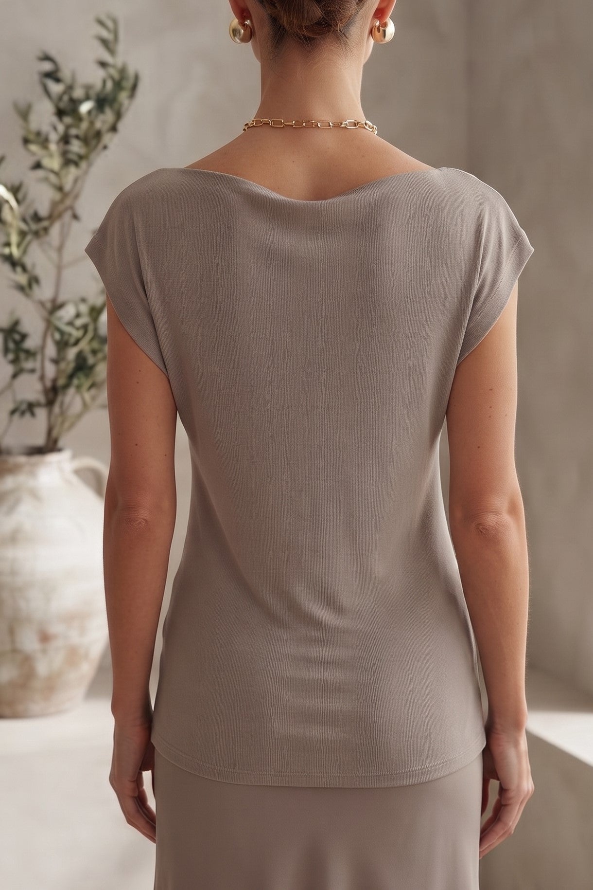 BLUSA HOMBROS IRREGULARES