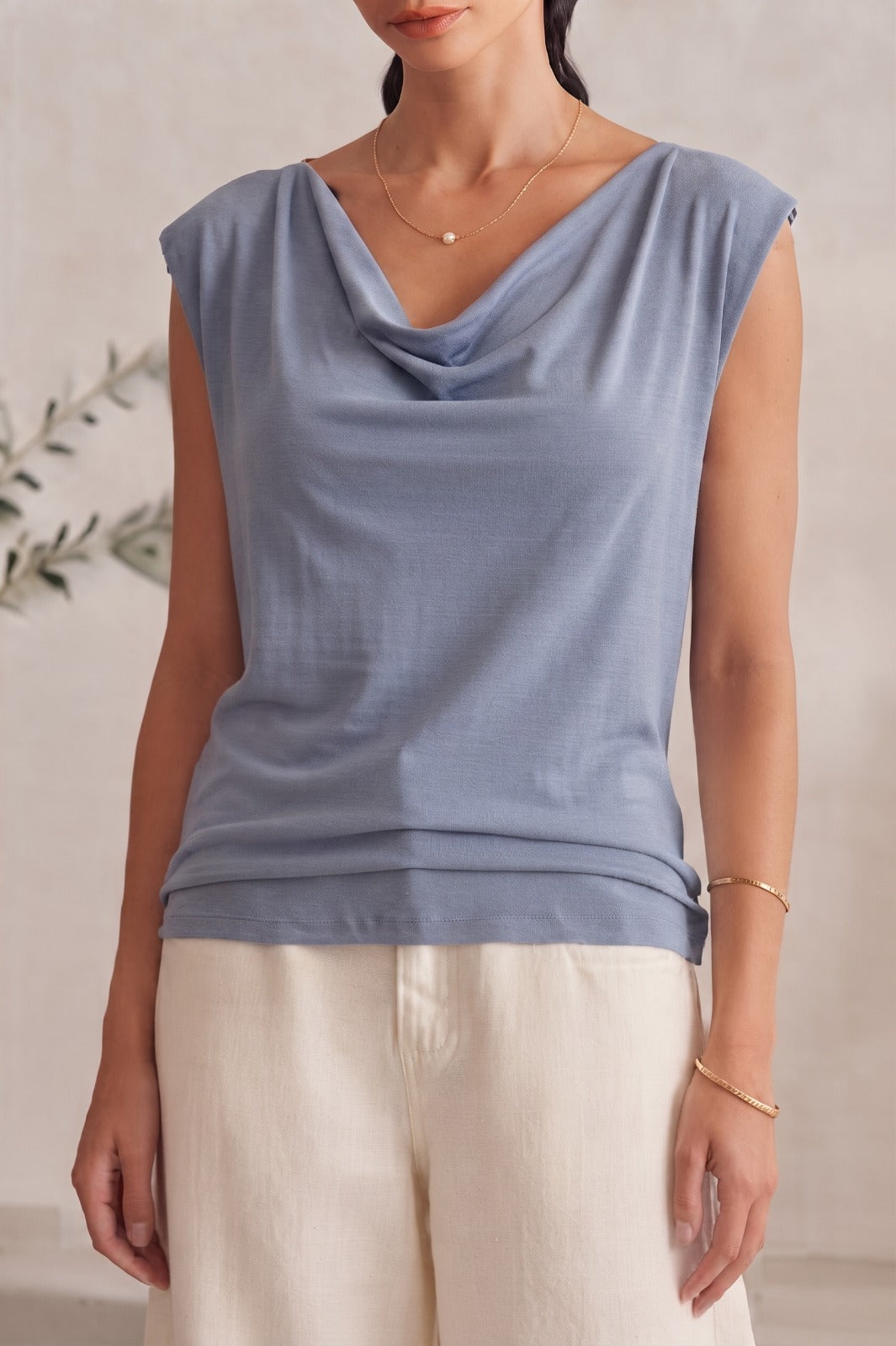 BLUSA HOMBROS IRREGULARES