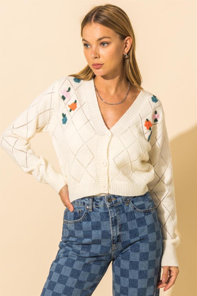 SWEATER WITH FLOWER DETAIL